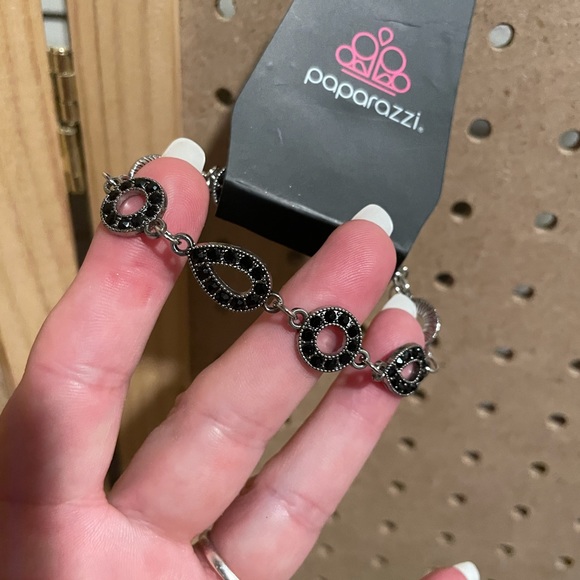 Delicate silver bracelet with teardrop and circular shapes w/black rhinestones. - Picture 3 of 3